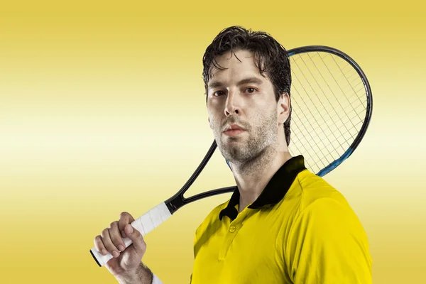 Tennis player with a yellow shirt. — Stock Photo, Image