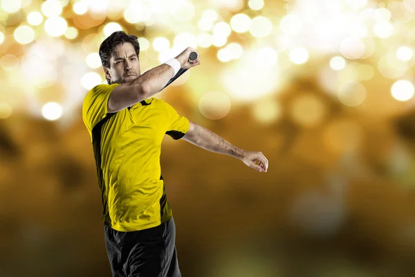 Tennis player with a yellow shirt. — Stock Photo, Image