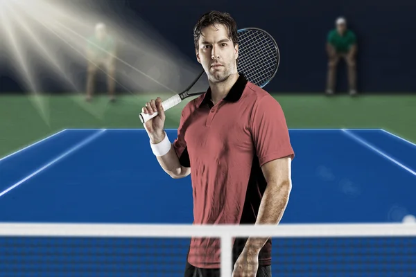Tennisspielerin mit rosa Hemd. — Stockfoto