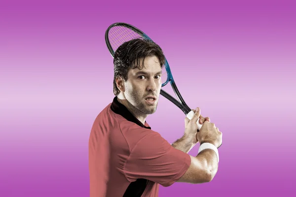 Tennisspelare med en rosa skjorta. — Stockfoto