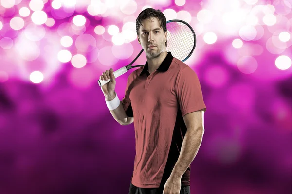 Tennisspeler met een roze shirt. — Stockfoto