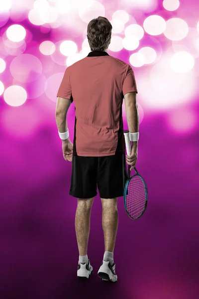 Jugador de tenis con camisa rosa . — Foto de Stock