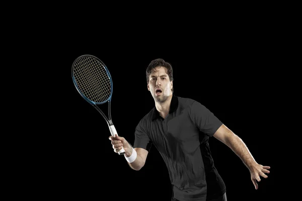 Jogador de tênis com camisa preta . — Fotografia de Stock