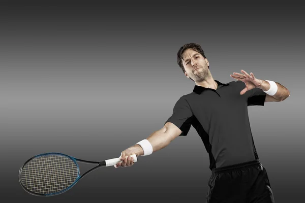 Tennisspieler mit schwarzem Hemd. — Stockfoto