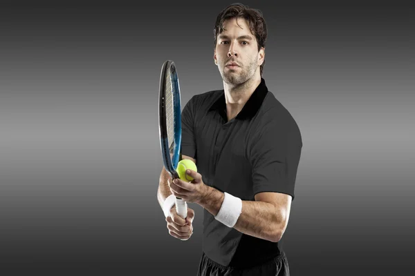 Tennis player with a black shirt. — Stock Photo, Image