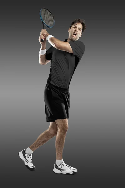 Jugador de tenis con camisa negra . — Foto de Stock