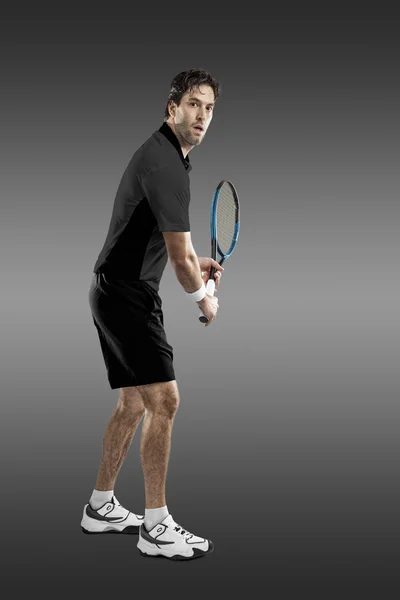 Tennisspieler mit schwarzem Hemd. — Stockfoto