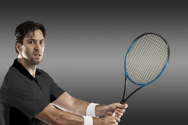 Tennisspieler mit schwarzem Hemd. — Stockfoto