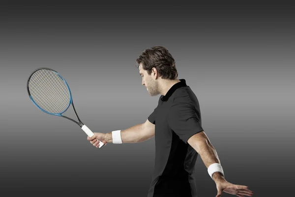 Jugador de tenis con camisa negra . —  Fotos de Stock