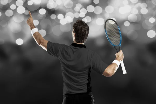 Tennisspeler met een zwart shirt. — Stockfoto