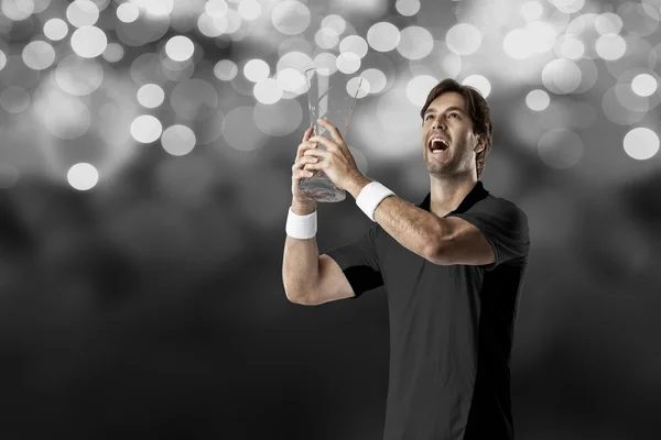 Tennis player with a black shirt. — Stock Photo, Image