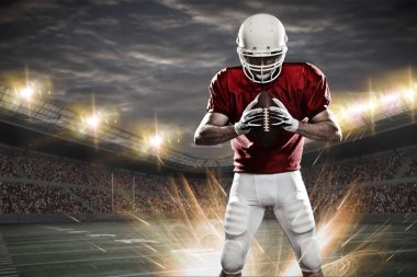 Futbolcu üzerinde kırmızı üniforma