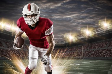 Futbolcu üzerinde kırmızı üniforma