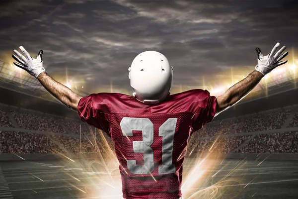 Football Player on a Red uniform — Stock Photo, Image