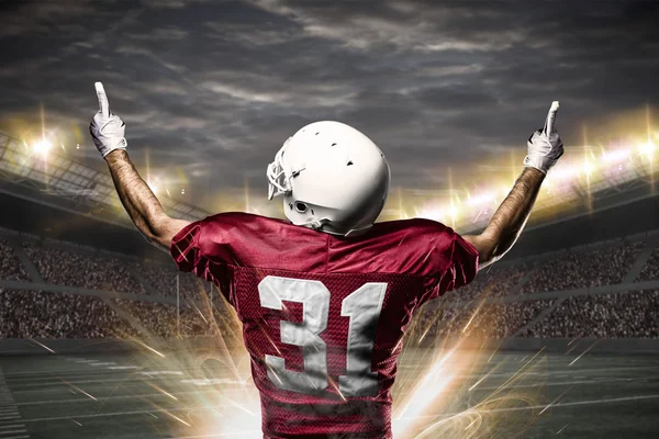 Fußballer in roter Uniform — Stockfoto