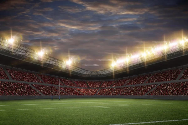 Estadio de rugby con abanicos vestidos con uniformes rojos — Foto de Stock