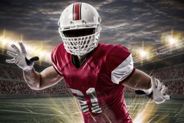 Futbolcu üzerinde kırmızı üniforma