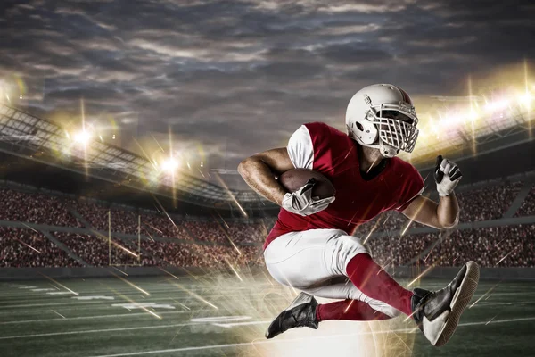 Fußballer in roter Uniform — Stockfoto