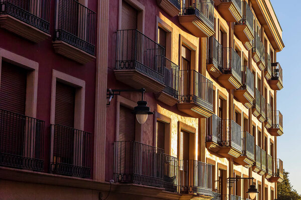 View of an old house facade with lot of balconies in Alcoi, Alicante, Spain.