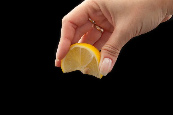 Squeeze lemon juice on hand for — Stock Photo, Image