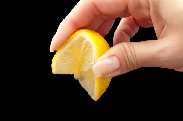 Squeeze lemon juice on hand for — Stock Photo, Image