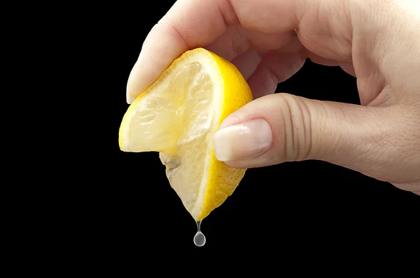 Barman pelando un limon Stock Photo