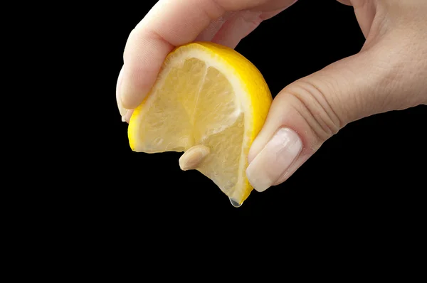 Squeeze lemon juice on hand for — Stock Photo, Image