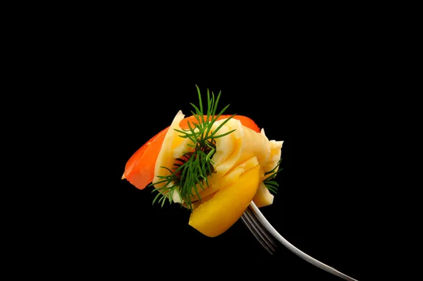 Cheese, tomato and dill on a fork on black background — Stock Photo, Image