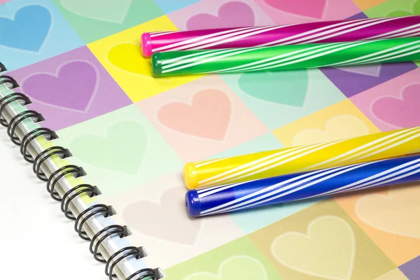 Colorful heart graphic cover notebook, diary with colorful pen