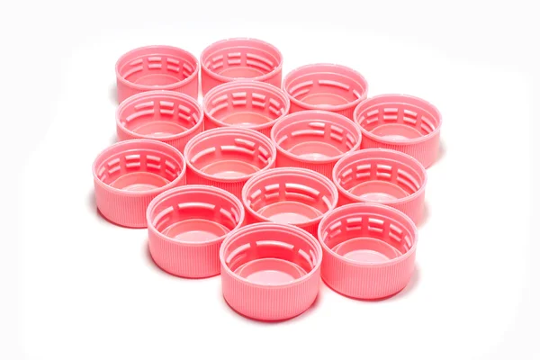 Pink plastic bottle caps — Stock Photo, Image