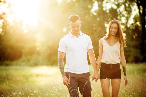 A man and a girl with a tattoo — Stock Photo, Image