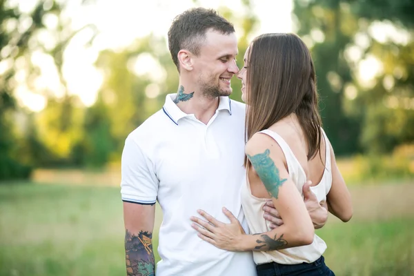 A man and a girl with a tattoo — Stock Photo, Image