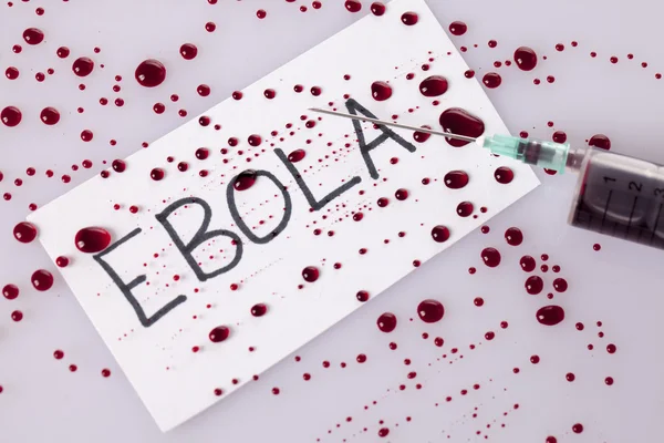 Ebola concept with blood filled syringe — Stock Photo, Image