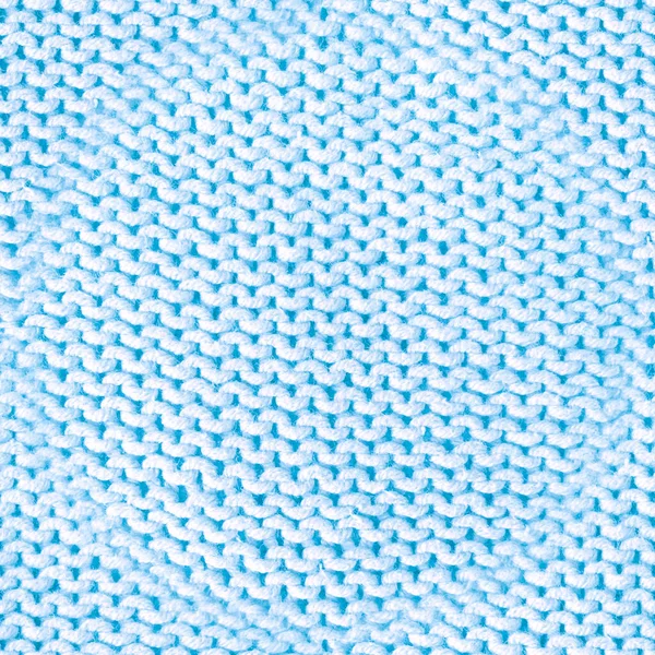 Modrý vzor pletení. Ručně vyráběné teplé pozadí. — Stock fotografie