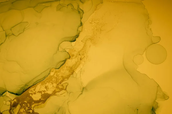 Gold Fluid Art. Abstract Liquid Background.