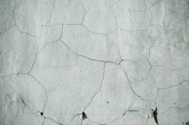 Eski çatlamış gri beton duvarın dokusu