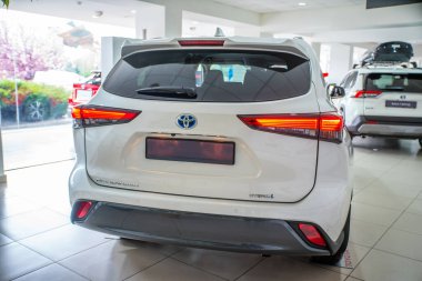 Uzhhorod, Ukraine. January 2021 white car of the Japanese brand Toyota Highlander. SUV, crossover. Reliable and beautiful car. The car in the cabin.	
