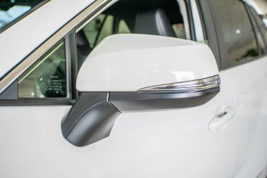 Uzhhorod, Ukraine. January 2021 white car of the Japanese brand Toyota RAV 4 hybrid. SUV, crossover. Reliable and beautiful car. The car in the cabin.	