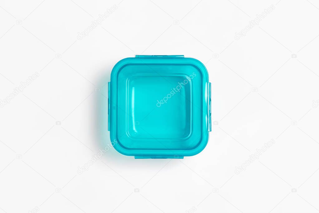 Glass food container with plastic lid isolated on white background. Storage container.High-resolution photo.