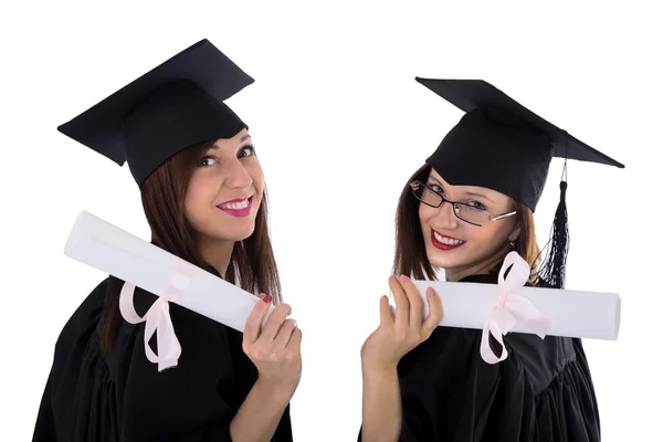 Chicas jóvenes en manto de estudiante con diploma —  Fotos de Stock