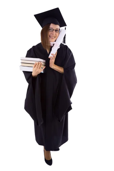 Niña en manto de estudiante con diploma y pila de libros —  Fotos de Stock