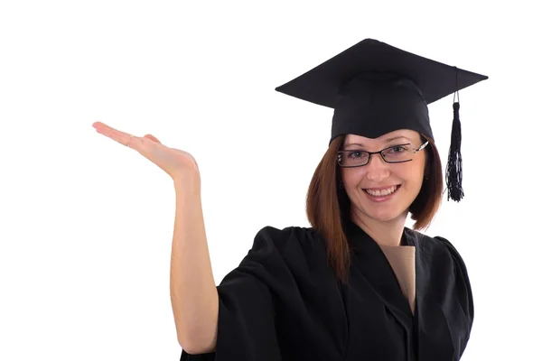 Young girl in student mantle indicates hand — Stock Photo, Image