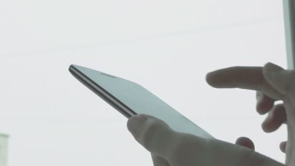 Womans hand using a smartphone — Stock Video