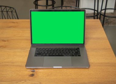 Yeşil ekranlı dizüstü bilgisayar. Geçmişi. Yeşil ekran. Modelleme. Laptop masada.