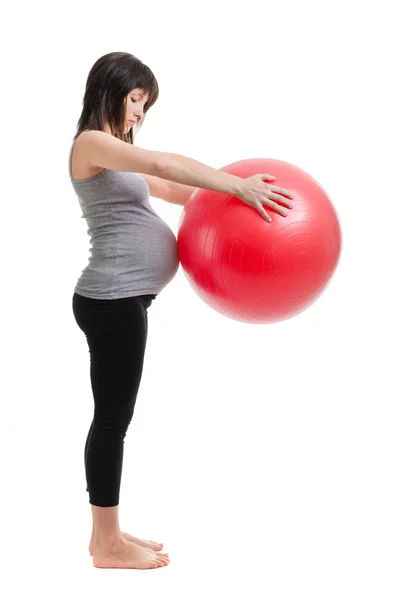 Mulher grávida está envolvida na aptidão — Fotografia de Stock