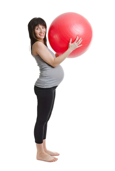 Den unga vackra gravida kvinnan — Stockfoto