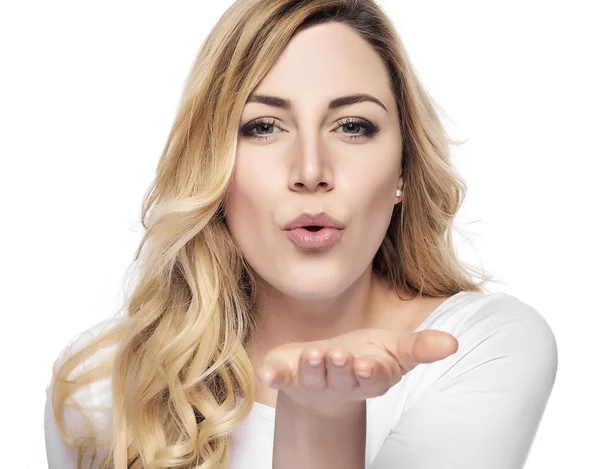 Blonde woman sending air kiss. — Stock Photo, Image