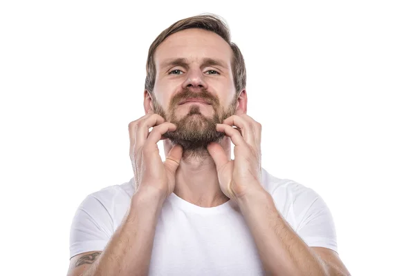 Felnőtt férfi karmoló szakáll. — Stock Fotó