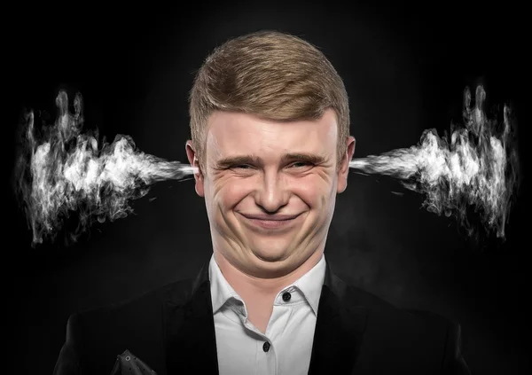 Стрессовый человек с дымом из ушей . — стоковое фото