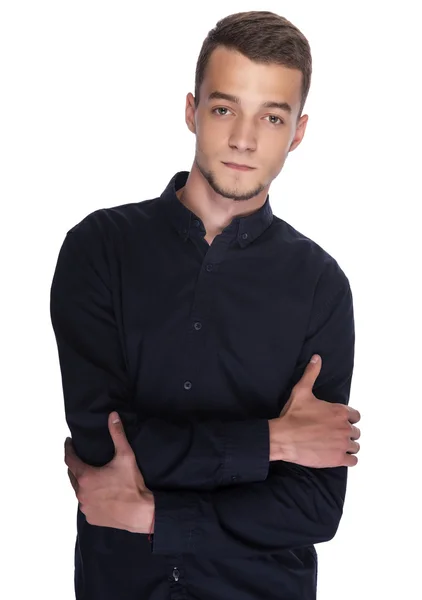 Joven hombre guapo con una camisa oscura . — Foto de Stock